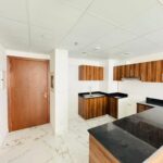 Modern 1-bedroom apartment interior with living area and bedroom layout.